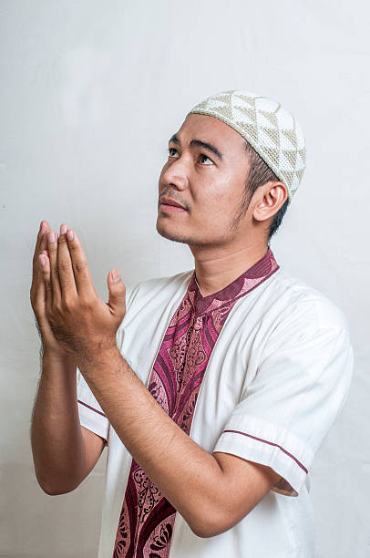 Asian Muslim Man Praising God stock photo