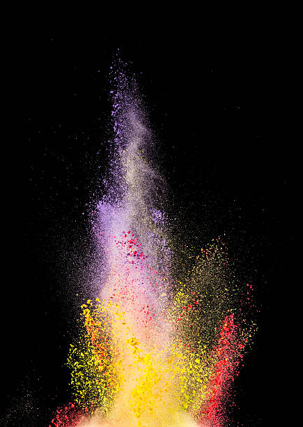 istock Explosion of colored powder on black background 537542198
