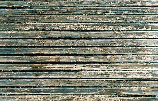 istock Weathered wooden house wall texture. 537543392