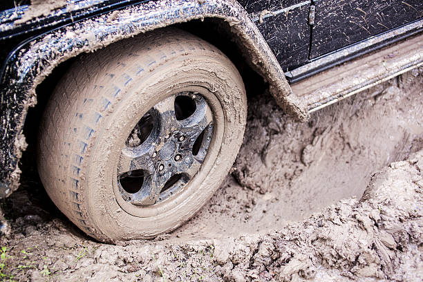 istock SUV got stuck in the mud, wheel closeup 537544162