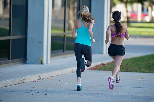 istock Girl Friends Jogging Together 537547230