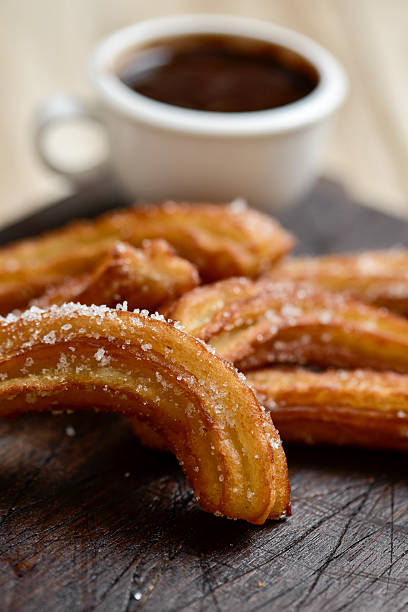 istock churros con chocolate, a typical Spanish sweet snack 537547728