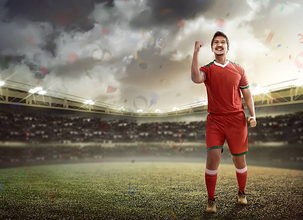istock Winning football player 537549030
