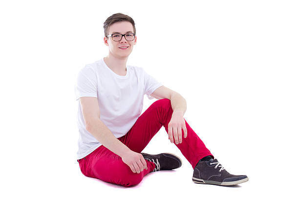 istock handsome man in white t-shirt sitting isolated 537549246