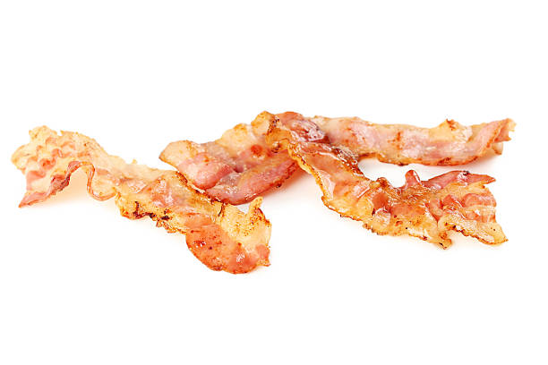 istock Crispy strips of bacon isolated on a white 537549444