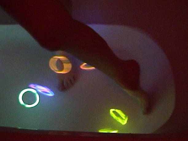 istock Legs and foots in a bath with light color 537550272