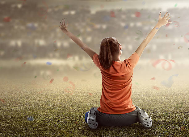 istock Winning football player 537550624