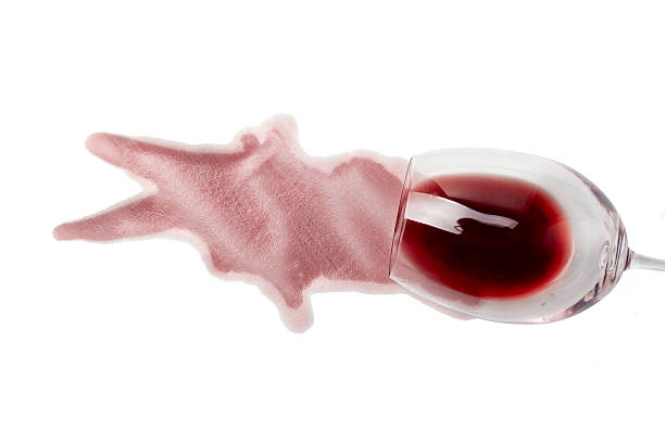 red wine drink beverage splashing stain dirty close up red wine stains on white backgroundclose up red wine stains on white background wine glass knocked over stock pictures, royalty-free photos & images