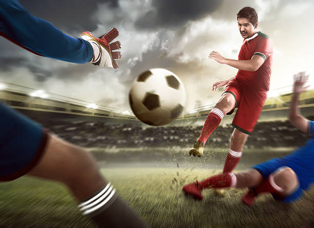 istock Man kick ball on the goalkeeper 537551188