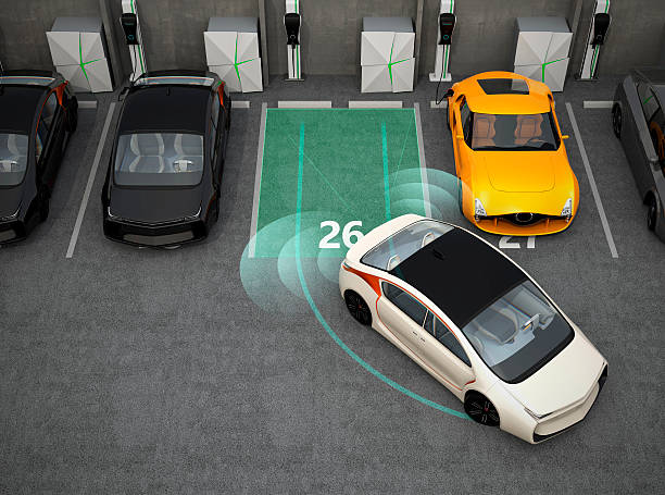 weißen auto fahren auf den parkplatz mit parkmöglichkeiten stehen system - recharger stock-fotos und bilder