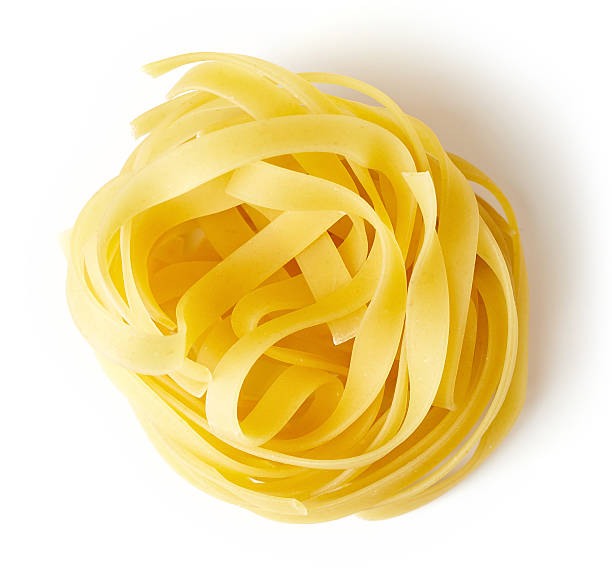 istock Pasta nest isolated on white, from above 537551458