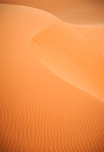waves of sand formed by wind in the Sahara Desert; Morocco
