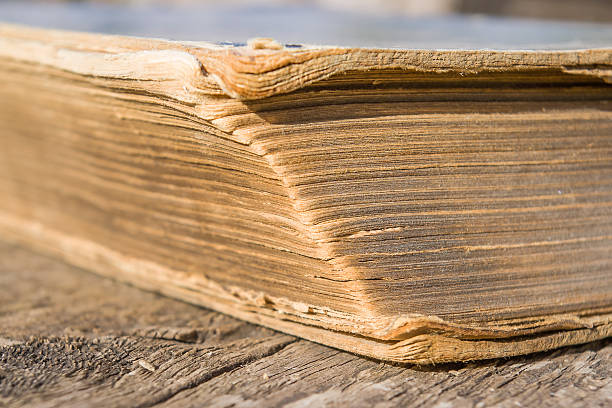 istock Old books on wooden table. Selective focus. 537552170