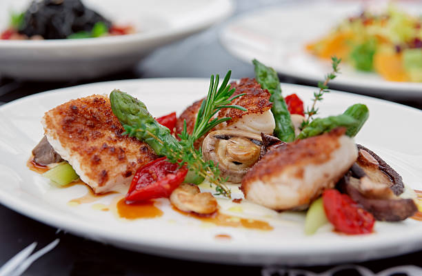 istock Fish fillet with mushrooms and asparagus 537552781