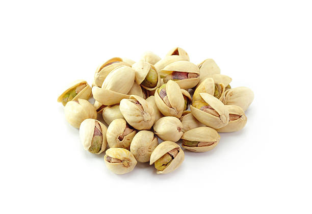 istock Heap of pistachios nuts. isolated om the white background 537553575