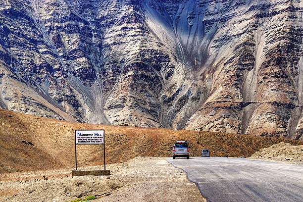Magnetic Hill , leh, Ladakh, Jammu and Kashmir, India A gravity hill where slow speed cars are drawn against gravity is famously known as "Magnetic Hill" , a natural wonder at Leh, Ladakh, Jammu and Kashmir, India ladakh region photos stock pictures, royalty-free photos & images