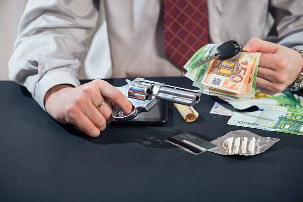 istock Man With Gun, Money, Drugs 537581193
