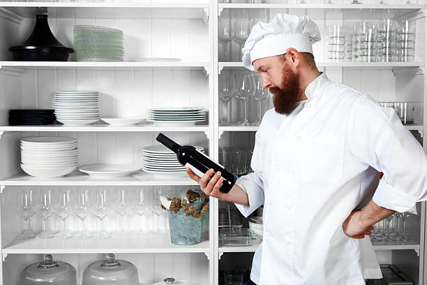 istock Chef of high cuisine looking at the wine 537583403