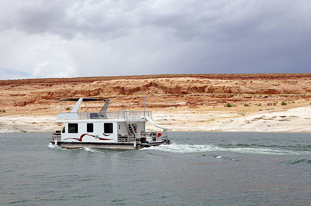 Boating and Fishing on Lake Powell - Recreating in the great outdoors in scenic red rock canyon walls on Lake Powell/Colorado River.