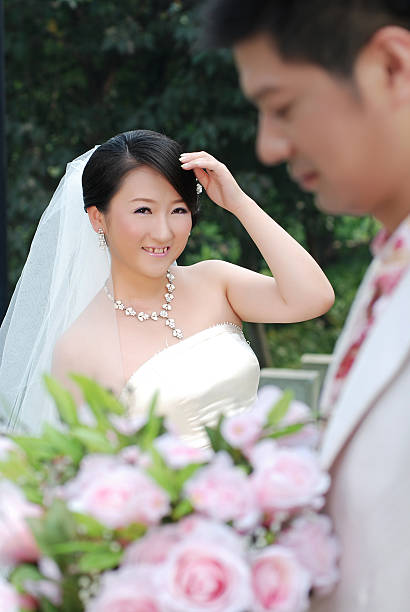 istock New married couples outdoors 537584725