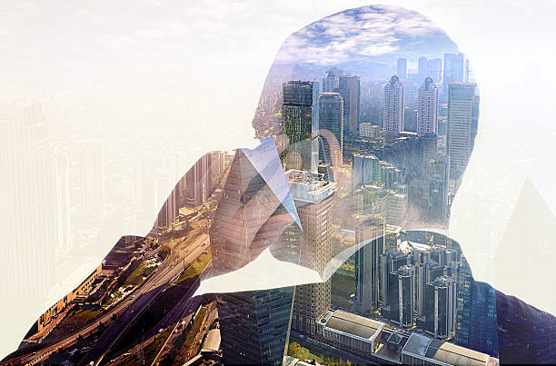 istock Businessman on the phone double exposure 537585315