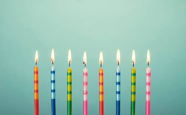 istock Colorful birthday cake candles 537586313