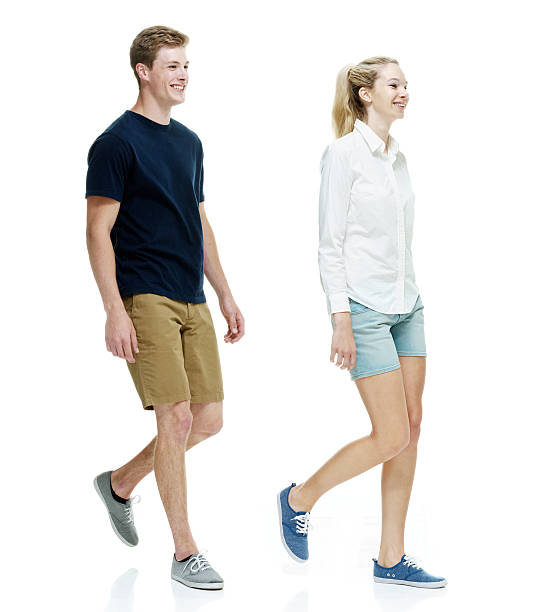 istock Smiling couple walking together 537586433