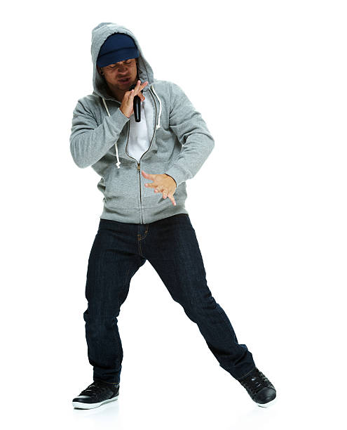 istock Rapper singing a song with microphone 537586533