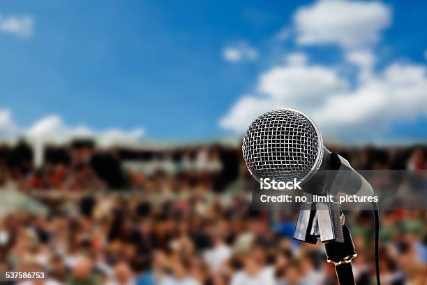 Microphone On Stage Stock Photo - Download Image Now - Outdoors, Audience, Blue