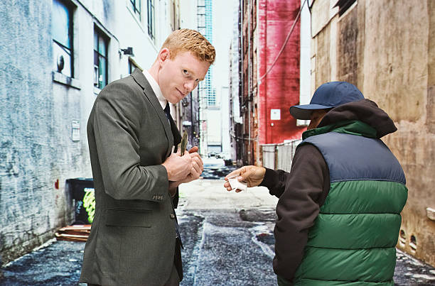 istock Businessman buying drugs 537587271
