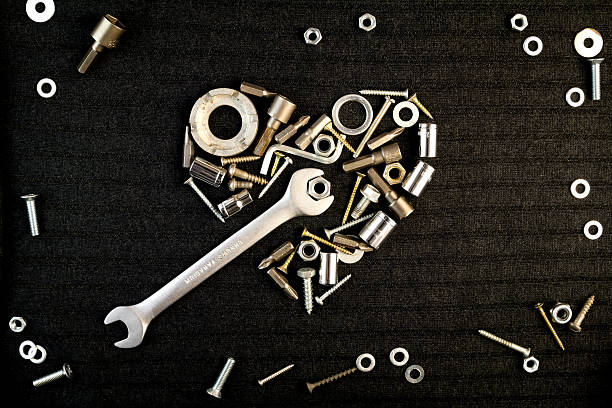 istock heart of the tools and screw nuts 537593865