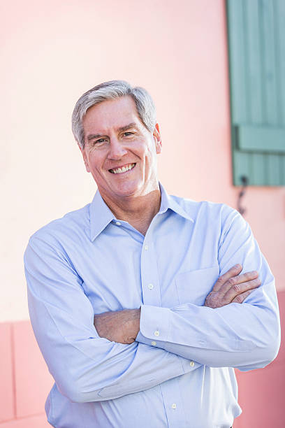 istock Senior man standing outdoors 537594503