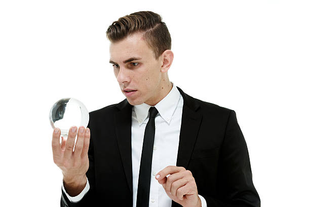 istock Businessman looking into crystal ball 537594887