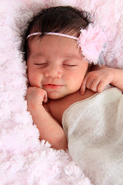 istock Smiling newborn baby 537594973