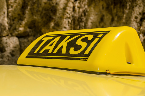 Yellow roof sign for a taxi in the Turkish city of Antalya.