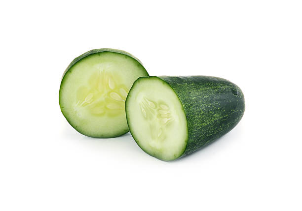 istock Cucumber and slices isolated over white background 537596153