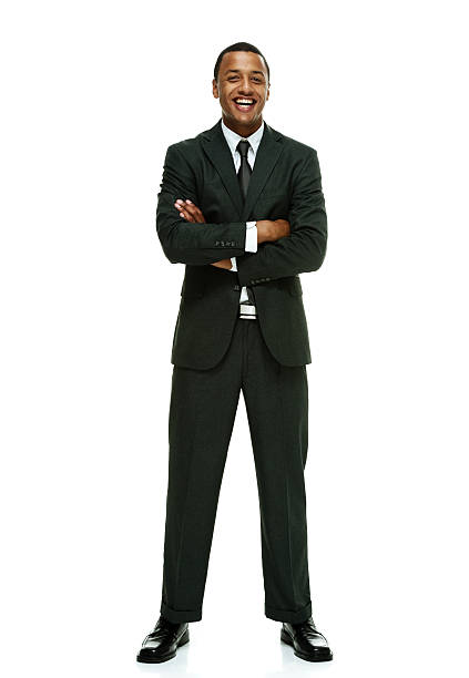 istock Cheerful businessman standing with arms crossed 537598383