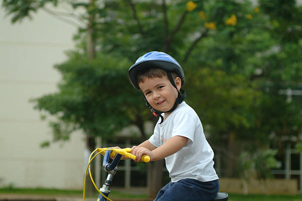 istock Child learning to ride a bike . 537598647