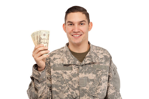 istock Happy soldier with money 537598663