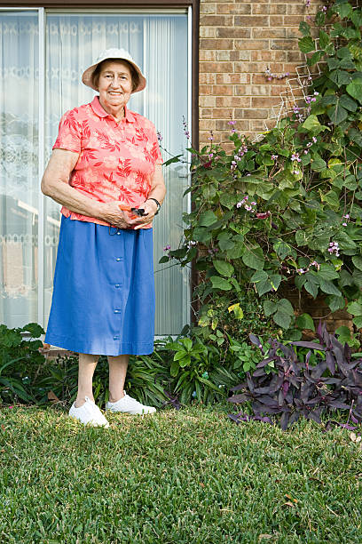 istock Senior woman gardening 537599249