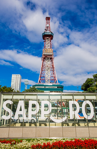 Sapporo, Japan - August 26, 2014: SAPPORO, JAPAN - AUGUST 26, 2014: Sapporo Tower stands over Odori Park. The 147.2 meter high tower has an observation deck open to tourists
