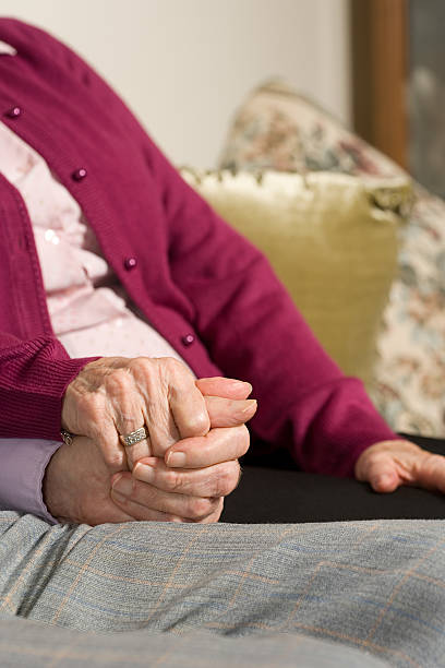 istock Senior couple holding hands 537599953