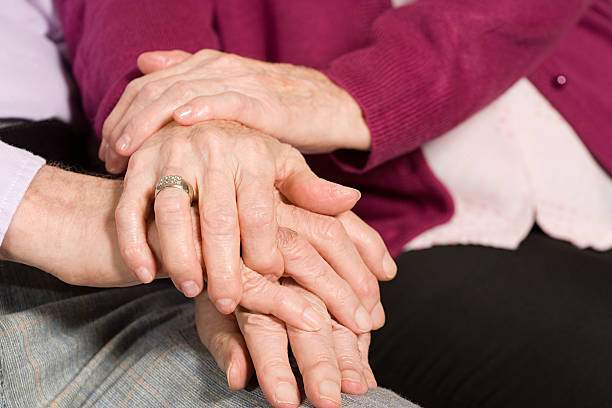 istock Elderly couple with hands together 537599987