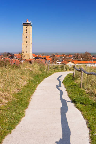 west-terschelling y brandaris terschelling faro de la isla - lighthouse beacon north sea coastal feature fotografías e imágenes de stock