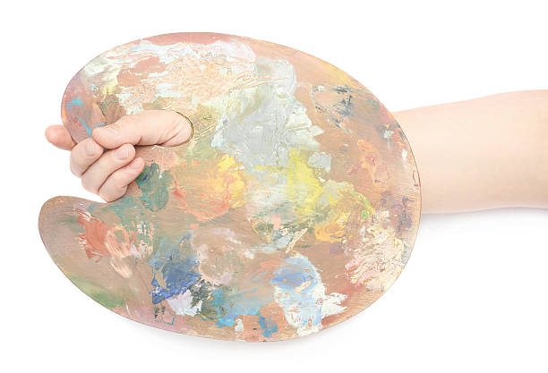 istock Hand holding a wooden palette isolated 537601950