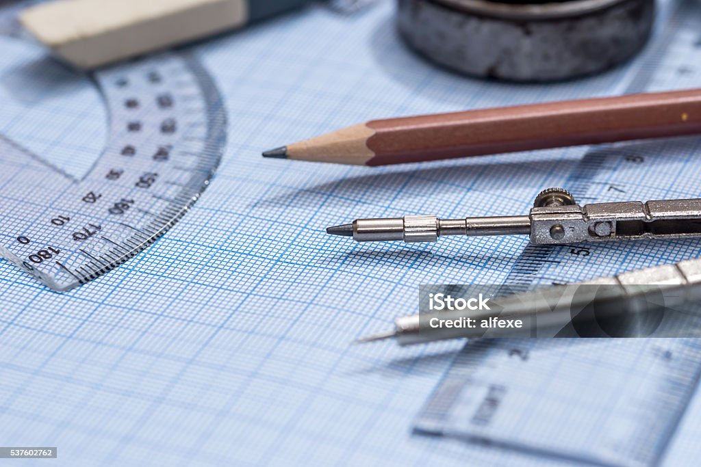 Drawing Board Ruler Compass Drawing Compass Pencil And Ruler On Graph Paper Background Stock Photo ...