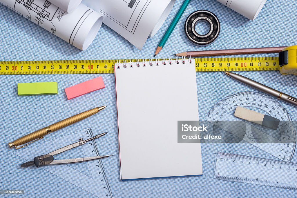 Engineer Rule Notepad Blank Notepad Rolls Engineering Drawings With Tools On Graph Background ...