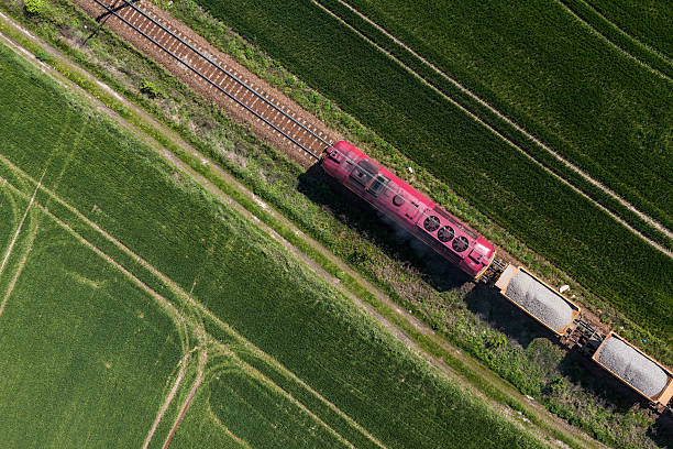 aerial view of the train on the railway track aerial view of the train on the railway track in Poland freight train stock pictures, royalty-free photos & images