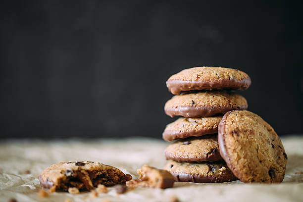 istock chocolate chip cookies with milk on kraft paper 537605184