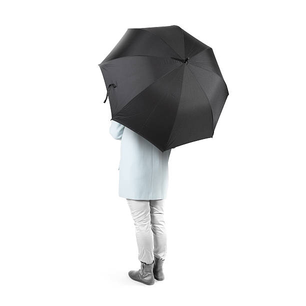 istock Women stand backwards with black blank umbrella mock up isolated 537606828